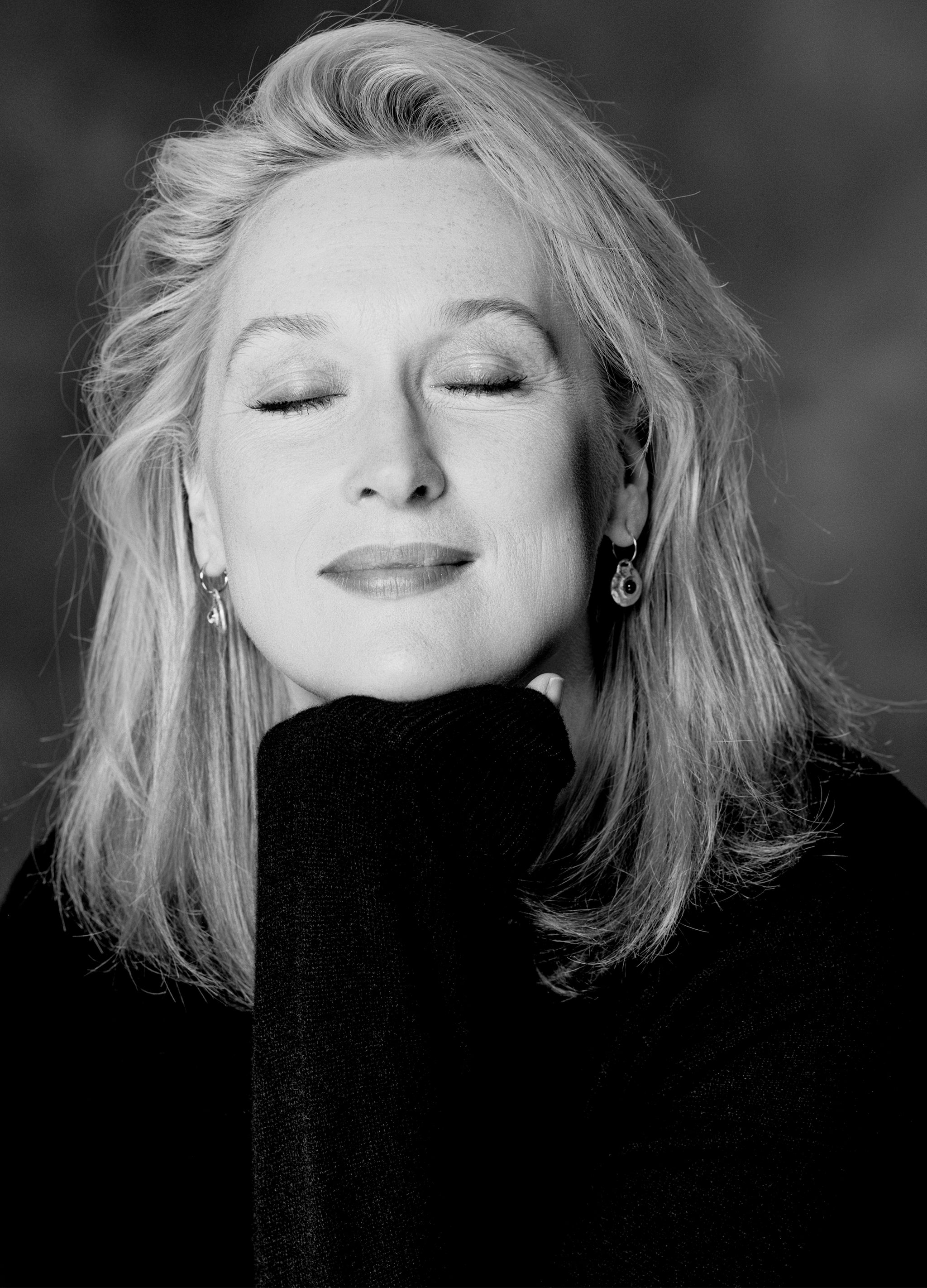 Meryl Streep (eyes closed, hand at chin)